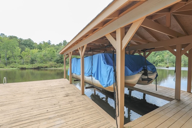 view of dock with a water view