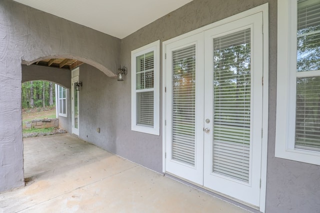 view of patio featuring french doors