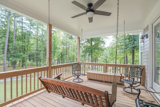 wooden deck with ceiling fan