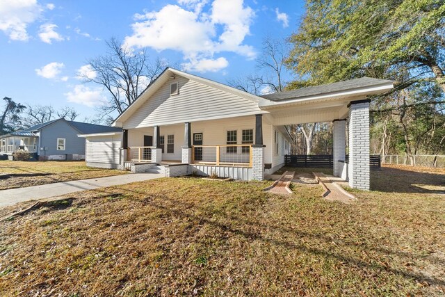 174 Main St, Toomsboro, GA 31090 - view of front of property with covered porch