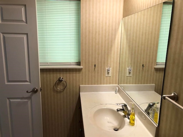 104 Wesley Ct, Eatonton, GA 31024 - bathroom with wallpapered walls and vanity
