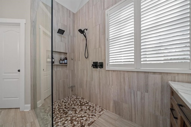 full bathroom featuring walk in shower