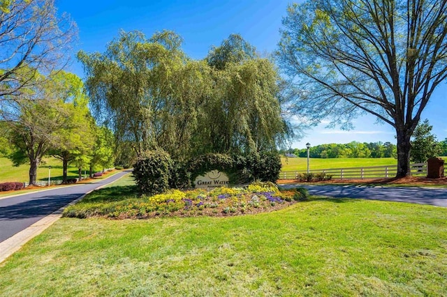 view of community featuring a lawn