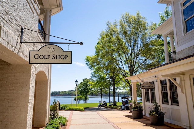 exterior space with a water view