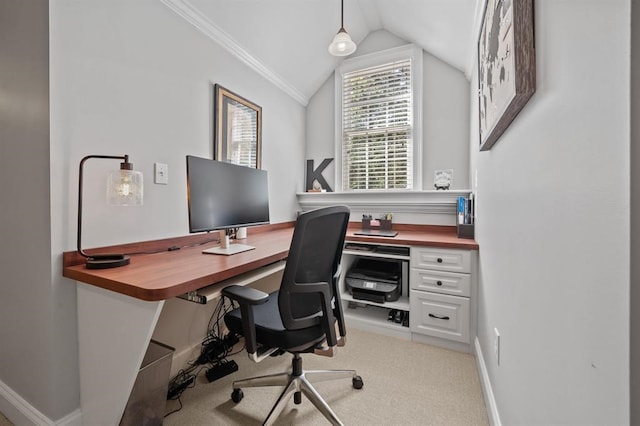 carpeted home office featuring baseboards, lofted ceiling, and crown molding