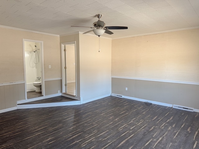 unfurnished room with ornamental molding, dark wood-type flooring, and ceiling fan