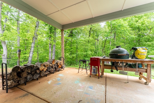 97 Heather Ln, Mansfield, GA 30055 - view of patio / terrace featuring a wooded view