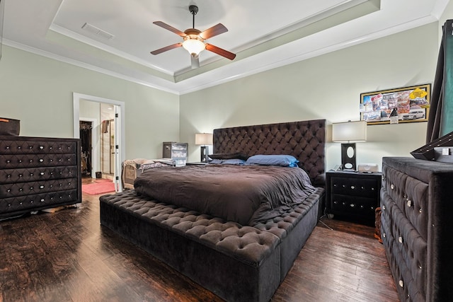 97 Heather Ln, Mansfield, GA 30055 - bedroom featuring ornamental molding, a raised ceiling, visible vents, and wood finished floors