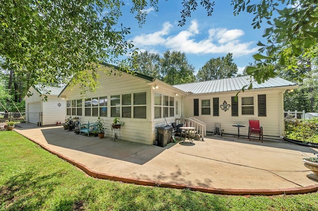 back of property featuring a patio