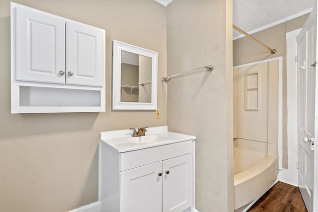 bathroom with vanity, wood-type flooring, and shower / bathing tub combination