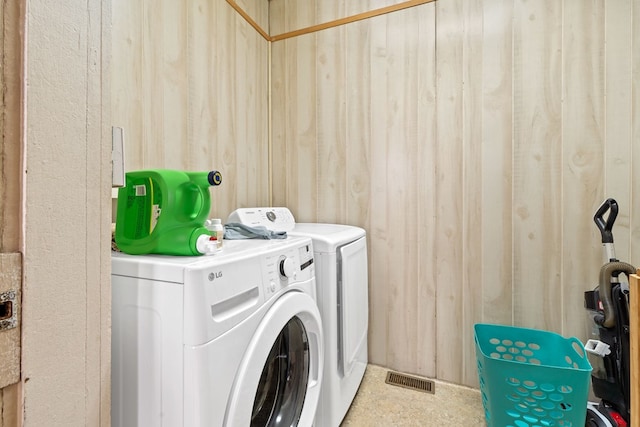 laundry area featuring independent washer and dryer