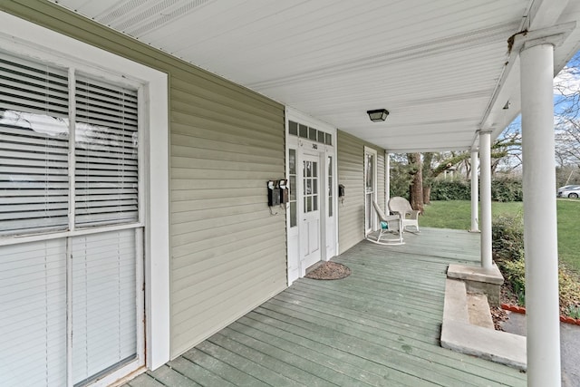 wooden deck featuring a porch