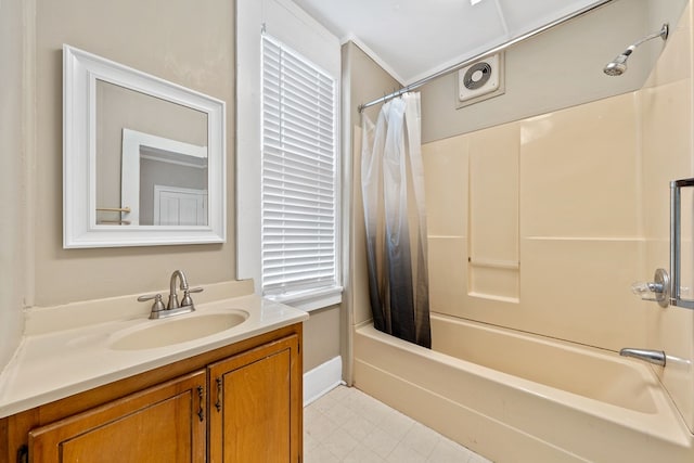 bathroom featuring vanity and shower / bath combo