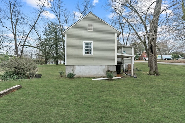 view of property exterior with a yard