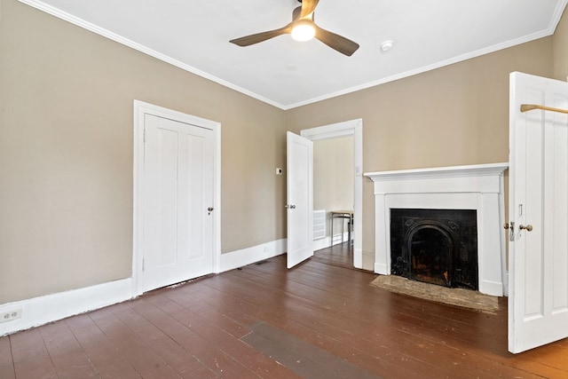 unfurnished living room with crown molding, dark wood-type flooring, and ceiling fan