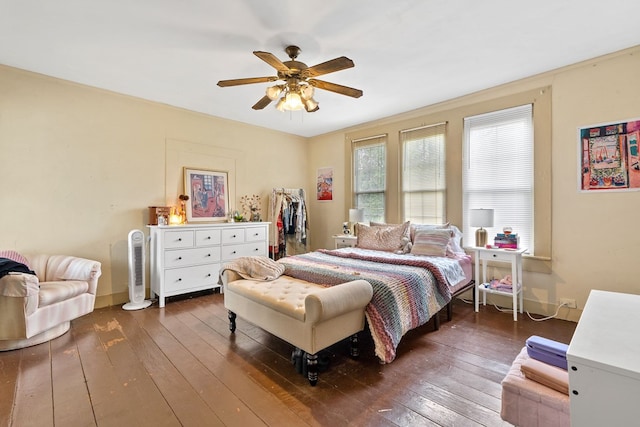 bedroom featuring dark wood-type flooring and ceiling fan