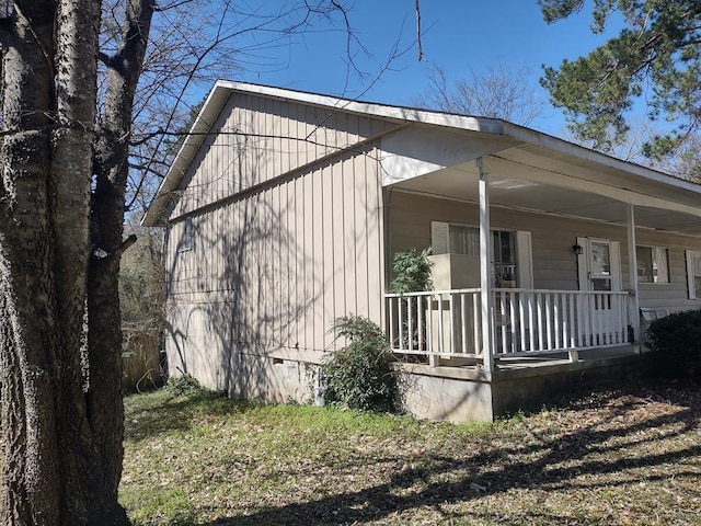 view of home's exterior with a porch