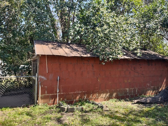 144 Bell Ave, Milledgeville, GA 31061 - view of outdoor structure with fence and an outdoor structure