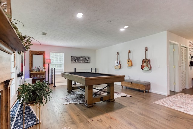 recreation room featuring recessed lighting, visible vents, pool table, a textured ceiling, and wood finished floors