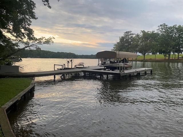 dock area featuring a water view