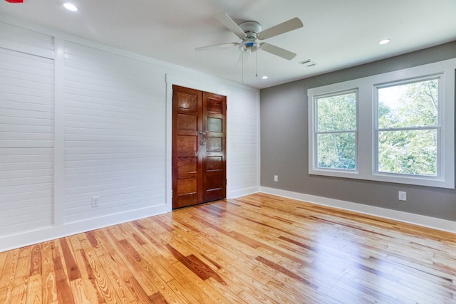 unfurnished bedroom featuring ceiling fan and light hardwood / wood-style floors