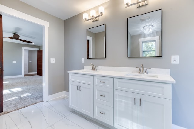 bathroom featuring vanity and ceiling fan