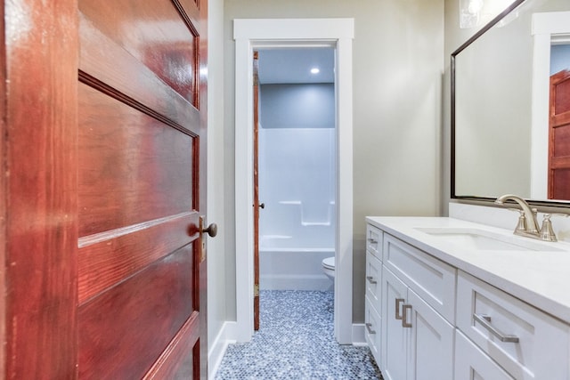 full bathroom with tile patterned floors, vanity, shower / bath combination, and toilet