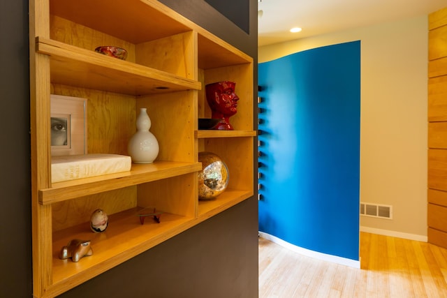 12737 Sanctuary Pl, Grand Haven, MI 49417 - interior space featuring wood finished floors and baseboards