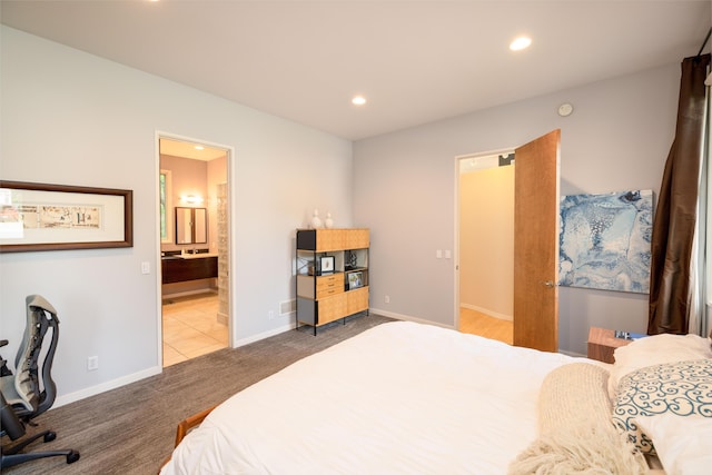 12737 Sanctuary Pl, Grand Haven, MI 49417 - carpeted bedroom featuring recessed lighting, connected bathroom, and baseboards