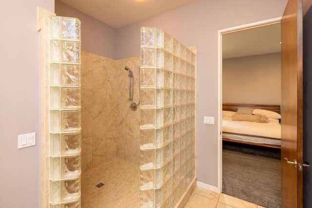 12737 Sanctuary Pl, Grand Haven, MI 49417 - ensuite bathroom with walk in shower and tile patterned flooring