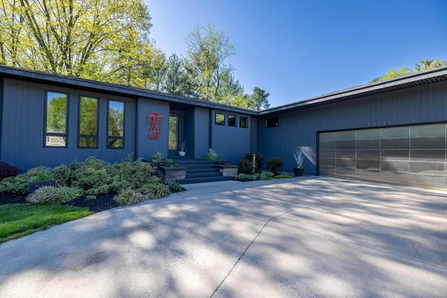 12737 Sanctuary Pl, Grand Haven, MI 49417 - ranch-style house with a garage and driveway