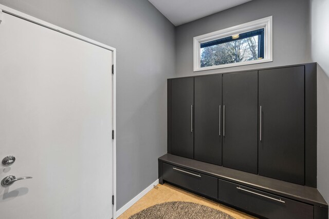 12737 Sanctuary Pl, Grand Haven, MI 49417 - mudroom featuring baseboards