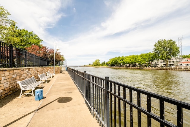 exterior space with a water view