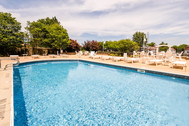 view of pool with a patio area