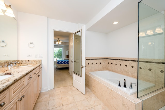 bathroom featuring tile patterned flooring, ceiling fan, dual bowl vanity, and separate shower and tub