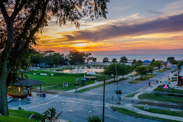 surrounding community featuring a water view