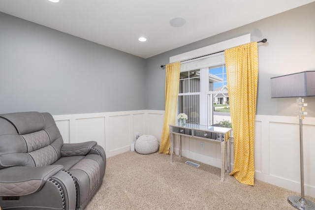 sitting room with light carpet