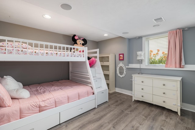 bedroom featuring hardwood / wood-style floors