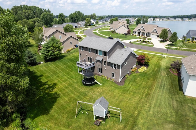 drone / aerial view featuring a water view