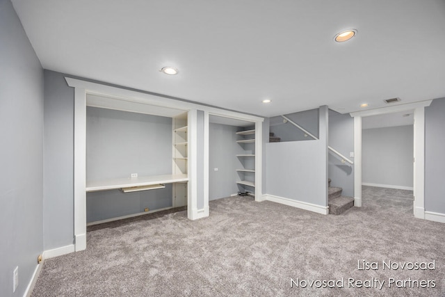 basement featuring carpet floors