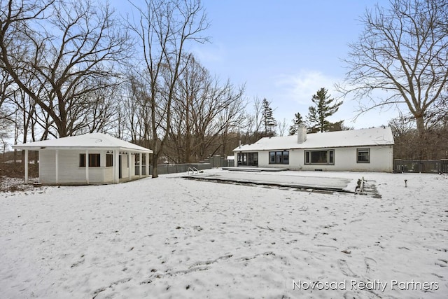 view of snow covered property