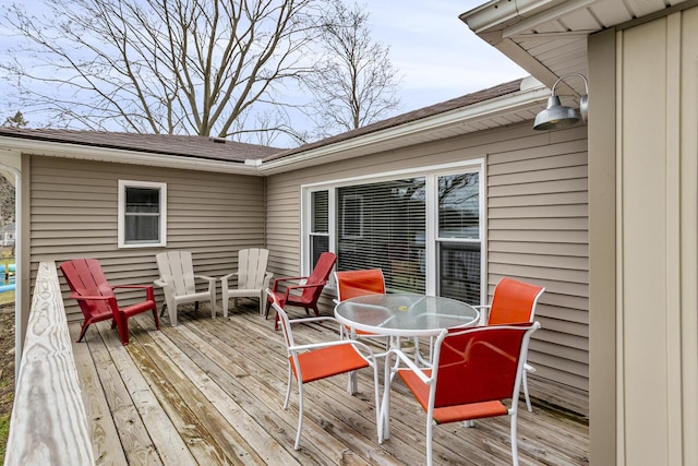 deck featuring outdoor dining space