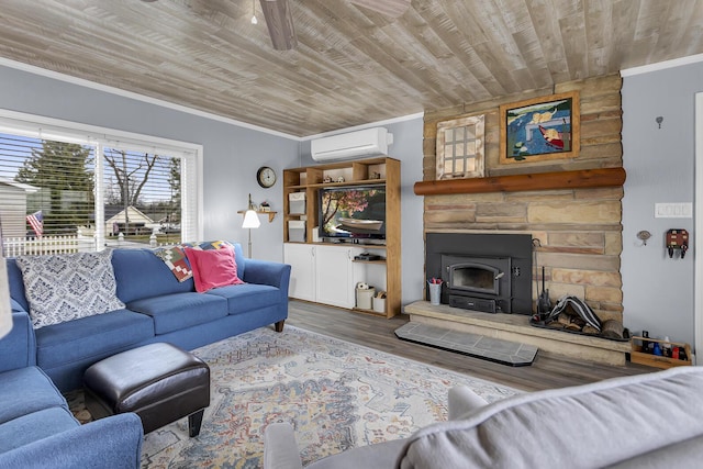 living area with a wood stove, wood ceiling, a wall unit AC, and crown molding