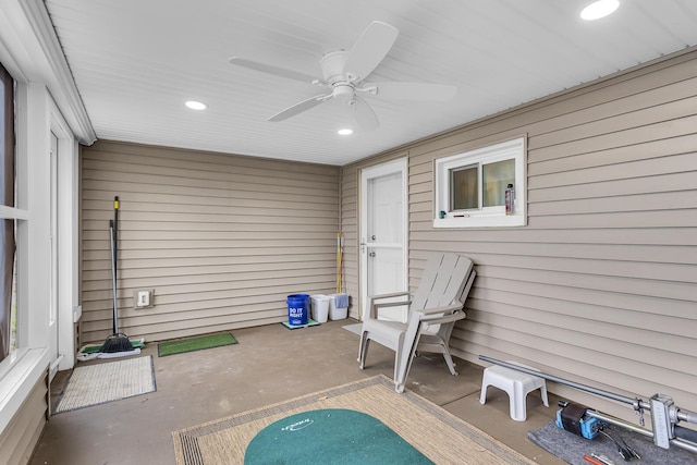exterior space featuring ceiling fan