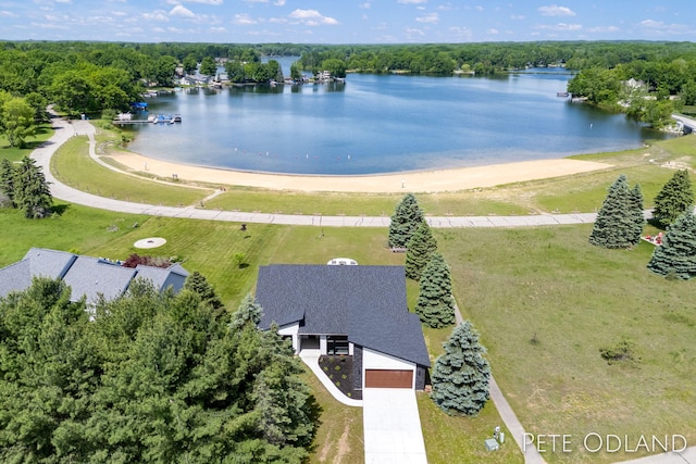 drone / aerial view with a water view