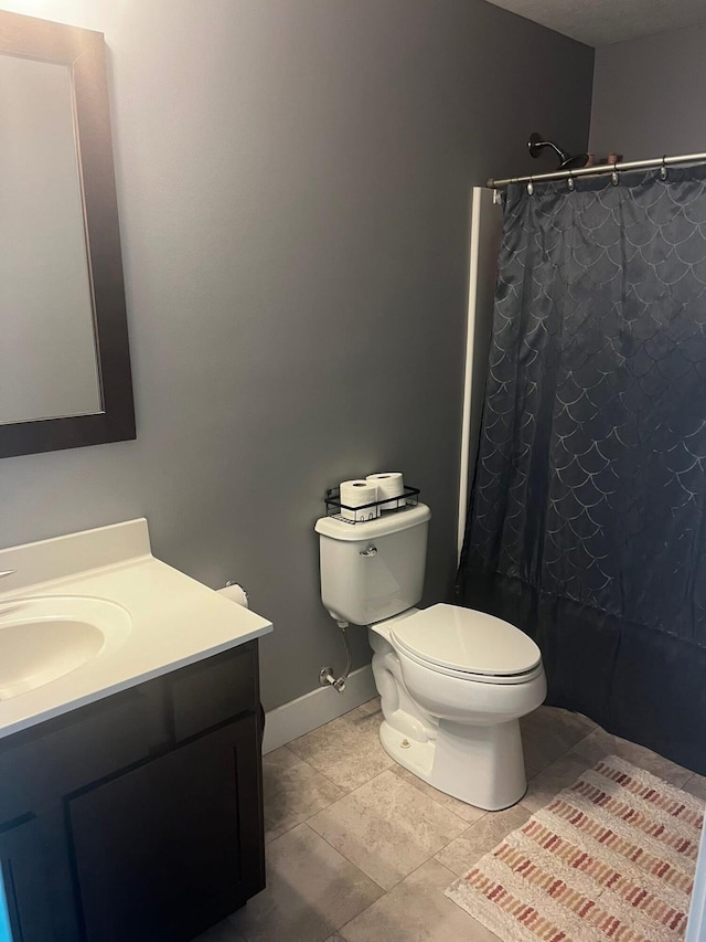 727 Wild Flower Ct, Wayland, MI 49348 - full bath featuring vanity, a shower with curtain, and tile patterned floors