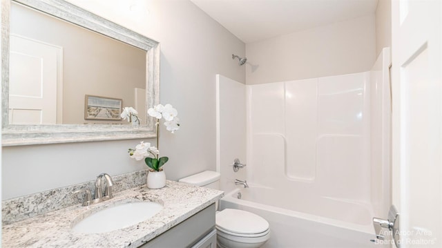 full bathroom with vanity, toilet, and shower / bath combination