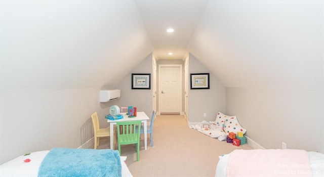 carpeted bedroom with vaulted ceiling