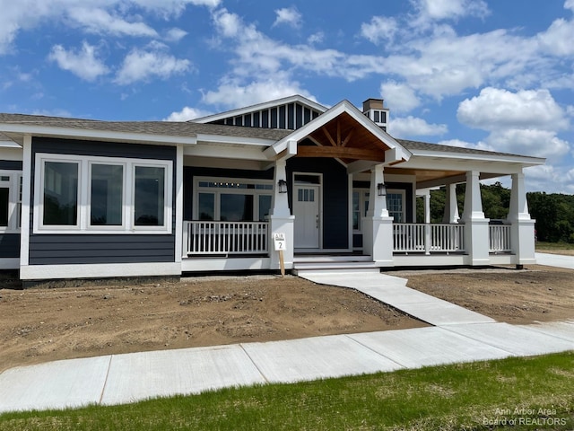 view of front of house featuring covered porch