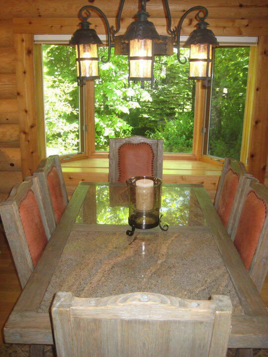 dining area featuring rustic walls